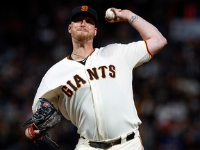 Will Smith of the San Francisco Giants pitches against the Oakland Athletics during the ninth inning at Oracle Park on Aug. 13, 2019, in San Francisco.