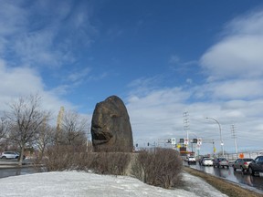 Archaeologists in Montreal have discovered remains from 12 to 15 people at a site believed to have been a cemetery for Irish immigrants who died after fleeing famine in 1847. The Irish commemorative stone, also called the black rock, is seen in Montreal on Friday, March 15, 2019.