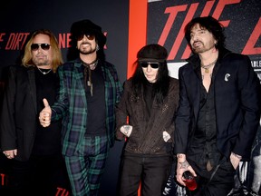 Vince Neil, Nikki Sixx, Mick Mars and Tommy Lee of Motley Crue arrive at the premiere of Netflix's "The Dirt" at ArcLight Hollywood on March 18, 2019 in Hollywood. (Kevin Winter/Getty Images)