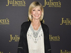 Olivia Newton-John attends the VIP reception for upcoming "Property of Olivia Newton-John Auction Event at Juliens Auctions in Beverly Hills, Calif., on Oct. 29, 2019.