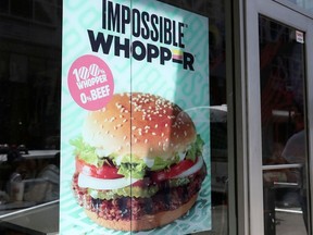 A sign advertising the soy based Impossible Whopper is seen outside a Burger King in New York, U.S., August 8, 2019.