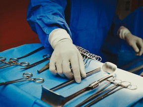 Close-up of surgical instruments in an operating room.