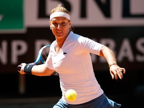 Dominika Cibulkova of Slovakia plays a forehand against Naomi Osaka of Japan in their Women's Singles Round of 32 Match during Day Five of the International BNL d'Italia at Foro Italico on May 16, 2019, in Rome, Italy.