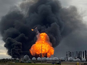 A process tower flies through the air after exploding at the TPC Group Petrochemical Plant during a blaze at the plant in Port Neches, Texas, U.S., November 27, 2019. (REUTERS/Erwin Seba)