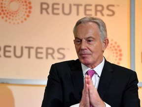 Former British Prime Minister Tony Blair speaks during an interview with Axel Threlfall at a Reuters Newsmaker event on "The challenging state of British politics" in London, on Monday, Nov. 25, 2019.