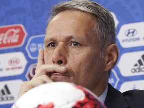 Marco van Basten attends a news conference before the upcoming Confederations Cup in St. Petersburg, Russia, Thursday, June 15, 2017. (AP Photo/Dmitri Lovetsky)