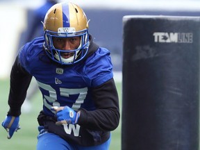 Safety Brandon Alexander charges a tackling dummy during Winnipeg Blue Bombers practice in Winnipeg on Wednesday, Nov. 13, 2019.