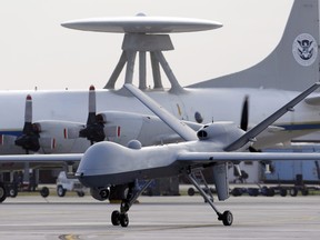 In this Nov. 8, 2011 file photo, a Predator B unmanned aircraft taxis at the Naval Air Station in Corpus Christi, Texas. (AP Photo/Eric Gay, File)