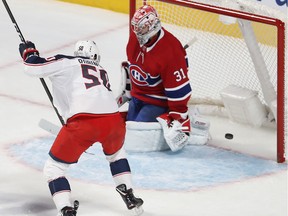 Columbus Blue Jackets' Eric Robinson scores on Canadiens goaltender Carey Price during first period in Montreal on Nov. 12, 2019.