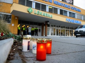 Candles are seen outside the Ostrava Teaching Hospital after a shooting incident on December 10, 2019 in Ostrava, Czech Republic.