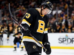Charlie McAvoy of the Boston Bruins looks on during the second period of the game against the Chicago Blackhawks at TD Garden on December 5, 2019 in Boston, Massachusetts.
