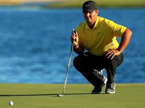Patrick Reed of the United States lines up a putt on the 18th hole during the third round of the Hero World Challenge on Dec. 6, 2019 in Nassau, Bahamas. (Mike Ehrmann/Getty Images)