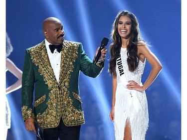 Steve Harvey interviews Miss Portugal Sylvie Silva onstage at the 2019 Miss Universe Pageant at Tyler Perry Studios in Atlanta, Ga., on Dec. 8, 2019.