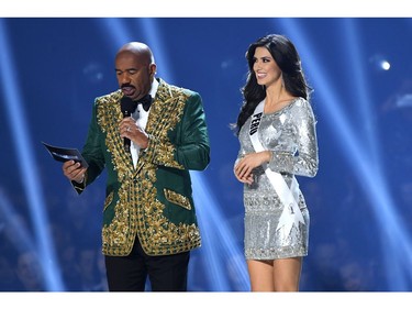 Steve Harvey interviews Miss Peru Kelin Rivera onstage at the 2019 Miss Universe Pageant at Tyler Perry Studios in Atlanta, Ga., on Dec. 8, 2019.