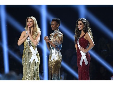 (L-R) Miss Puerto Rico Madison Anderson, Miss South Africa Zozibini Tunzi, Miss Mexico Sofía Aragón appear onstage at the 2019 Miss Universe Pageant at Tyler Perry Studios on Dec. 8, 2019 in Atlanta, Ga.