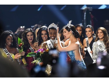 Miss Universe 2019 Zozibini Tunzi, of South Africa, is crowned onstage at the 2019 Miss Universe Pageant at Tyler Perry Studios on Dec. 8, 2019 in Atlanta, Ga.