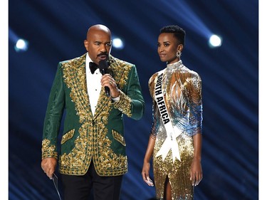 Steve Harvey and Miss South Africa Zozibini Tunzi speak onstage at the 2019 Miss Universe Pageant at Tyler Perry Studios on Dec. 8, 2019 in Atlanta, Ga.