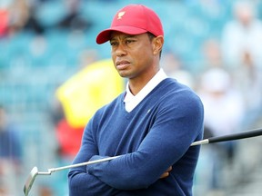 Captain Tiger Woods of the United States team reacts during practice ahead of the 2019 Presidents Cup at the Royal Melbourne Golf Course on December 10, 2019 in Melbourne, Australia.
