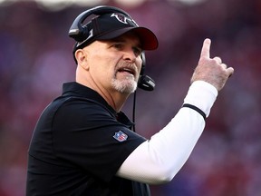 Head coach Dan Quinn of the Atlanta Falcons signals from the sidelines during the game against the San Francisco 49ers at Levi's Stadium on December 15, 2019 in Santa Clara, California.