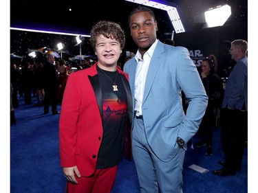 (L-R) Gaten Matarazzo and John Boyega attend the premiere of Disney's "Star Wars: The Rise of Skywalker" on Dec. 16, 2019 in Hollywood, Calif.