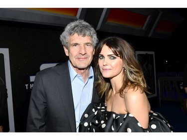 (L-R) Co-chairman and chief creative officer of The Walt Disney Studios Alan Horn and Keri Russell arrive for the Hollywood, Calif.