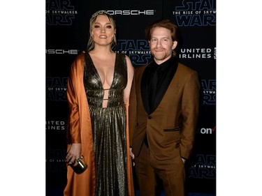 Clare Grant (L) and Seth Green arrive at the premiere of Disney's Star Wars: The Rise of Skywalker" on Dec. 16, 2019 in Hollywood, Calif.