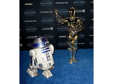 R2-D2 (L) and C-3PO arrive at the premiere of Disney's "Star Wars: The Rise of Skywalker," the highly anticipated conclusion of the Skywalker saga on Dec. 16, 2019 in Hollywood, Calif.