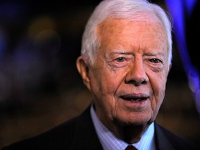 Former U.S. President Jimmy Carter attends the 2008 Democratic National Convention in Denver, Colorado, U.S. August 25, 2008.  (REUTERS/Eric Thayer/File Photo)