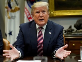 U.S. President Donald Trump speaks to reporters while participating in a "roundtable on small business and red tape reduction accomplishments" in the Roosevelt Room at the White House in Washington, D.C., Dec.  6, 2019. ( REUTERS/Kevin Lamarque)