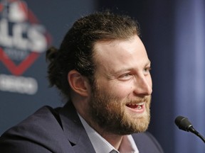 Gerrit Cole talks to the media at Yankee Stadium in New York, on an off-day during the ALCS between the Astros and the New York Yankees. Though it's not official, the Yankees landed the biggest prize of the free agent market, adding Cole to their rotation with a record $324-million, nine-year contract. (AP Photo/Kathy Willens, File)