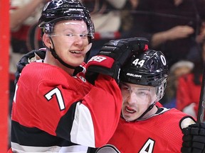 Senators' Jean-Gabriel Pageau (right) is congratulated by Brady Tkachuk after scoring in the first period on Monday night against the Buffalo Sabres. (WAYNE CUDDINGTON/Postmedia Network)