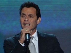 Singer Marc Anthony sings the National Anthem at the Time Warner Cable Arena in Charlotte, North Carolina, on September 6, 2012 on the final day of the Democratic National Convention (DNC).