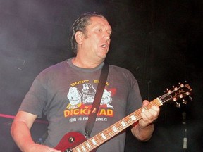 Sex Pistols guitarist Steve Jones performs with Camp Freddy during the grand opening of the Empire Ballroom October 22, 2005 in Las Vegas, Nevada.