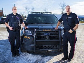 Calgary Police Service Sgt. Glenn Andruschuk, left and Calgary Police Sgt. Paul Wozney, who heads the domestic conflict response unit.
