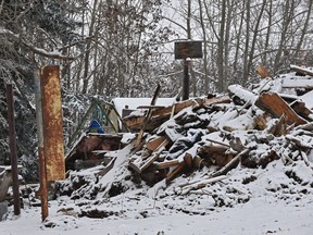 A swing and basketball net in the yard of this home that was destroyed as an investigation is underway after five people, three of them children, were found dead on Friday following a fire in the hamlet of Rochford Bridge, after fire services responded to the fire around 4 p.m. on Thursday, 130 km west of Edmonton, Dec. 7, 2019.