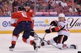 Ottawa Senators defenceman Erik Brannstrom (26) shoots the puck off the skate of Florida Panthers defenceman Anton Stralman (6) during the first period in Sunrise, Fla., on Monday. Jasen Vinlove-USA TODAY Sports