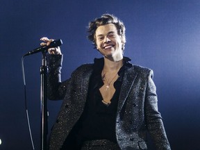 In this handout photo provided by Helene Marie Pambrun, Harry Styles performs during his European tour at AccorHotels Arena on March 13, 2018 in Paris, France.
