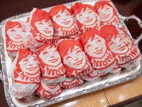 This photo shows food from Wendy's, some of the fast food the US president purchased for a ceremony honoring the 2018 College Football Playoff National Champion Clemson Tigers in the State Dining Room of the White House in Washington, DC, January 14, 2019.