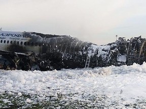 This handout picture taken and released on May 5, 2019 by the City News Agency 'Moscow' shows destroyed fuselage at a site of a fire of a Russian-made Superjet-100 at Sheremetyevo airport outside Moscow following its crash.