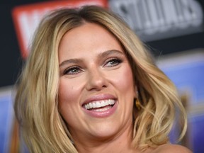 In this file photo taken on July 20, 2019 US actress Scarlett Johansson arrives on stage for the Marvel panel in Hall H of the Convention Center during Comic Con in San Diego, California.