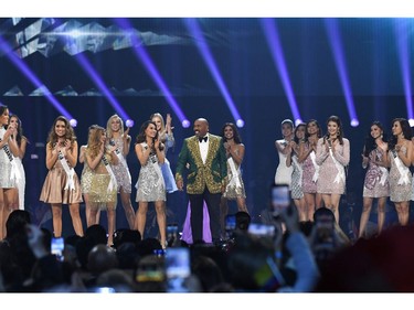 Entertainer Steve Harvey speaks on stage during the 2019 Miss Universe pageant at the Tyler Perry Studios in Atlanta, Ga., on Dec. 8, 2019.