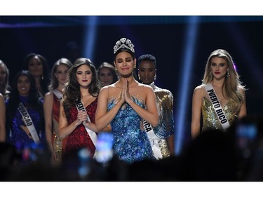 Miss Universe 2018 Philippines' Catriona Gray stands on stage during the 2019 Miss Universe pageant at the Tyler Perry Studios in Atlanta, Ga., on Dec. 8, 2019.