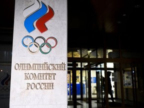 A person walks out of the Russian Olympic Committee (ROC) headquarters in Moscow on December 9, 2019.