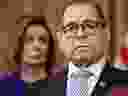 House Speaker Nancy Pelosi (D-CA) listens next to House Judiciary Chairman Jerry Nadler, right, Democrat of New York, House Permanent Select Committee on Intelligence House Committee on Oversight, speak to announce articles of impeachment for U.S. President Donald Trump during a press conference at the U.S. Capitol in Washington, D.C., Dec. 10, 2019. (SAUL LOEB/AFP via Getty Images)