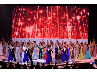 Dancers take to the stage during the opening sequence of the Miss World Final 2019 at the Excel arena in east London on Dec. 14, 2019.