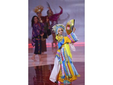 Miss China Li Peishan performs during the the Miss World Final 2019 at the Excel arena in east London on Dec. 14, 2019.