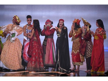 Miss World participants who qualify for Beauty for a Purpose celebrate during the the Miss World Final 2019 at the Excel arena in east London on Dec. 14, 2019.