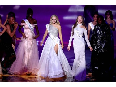 Miss United States Emmy Rose Cuvelier (L) and Miss Ukraine Marharyta Pasha appear during the the Miss World Final 2019 at the Excel arena in east London on Dec. 14, 2019.