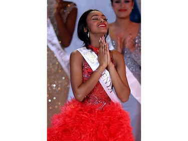 Miss Kenya Maria Nyamai reacts during the the Miss World Final 2019 at the Excel arena in east London on Dec. 14, 2019.