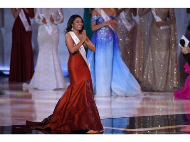 Miss Nepal Anushka Shrestha reacts to making the semi-finals during the the Miss World Final 2019 at the Excel arena in east London on Dec. 14, 2019.